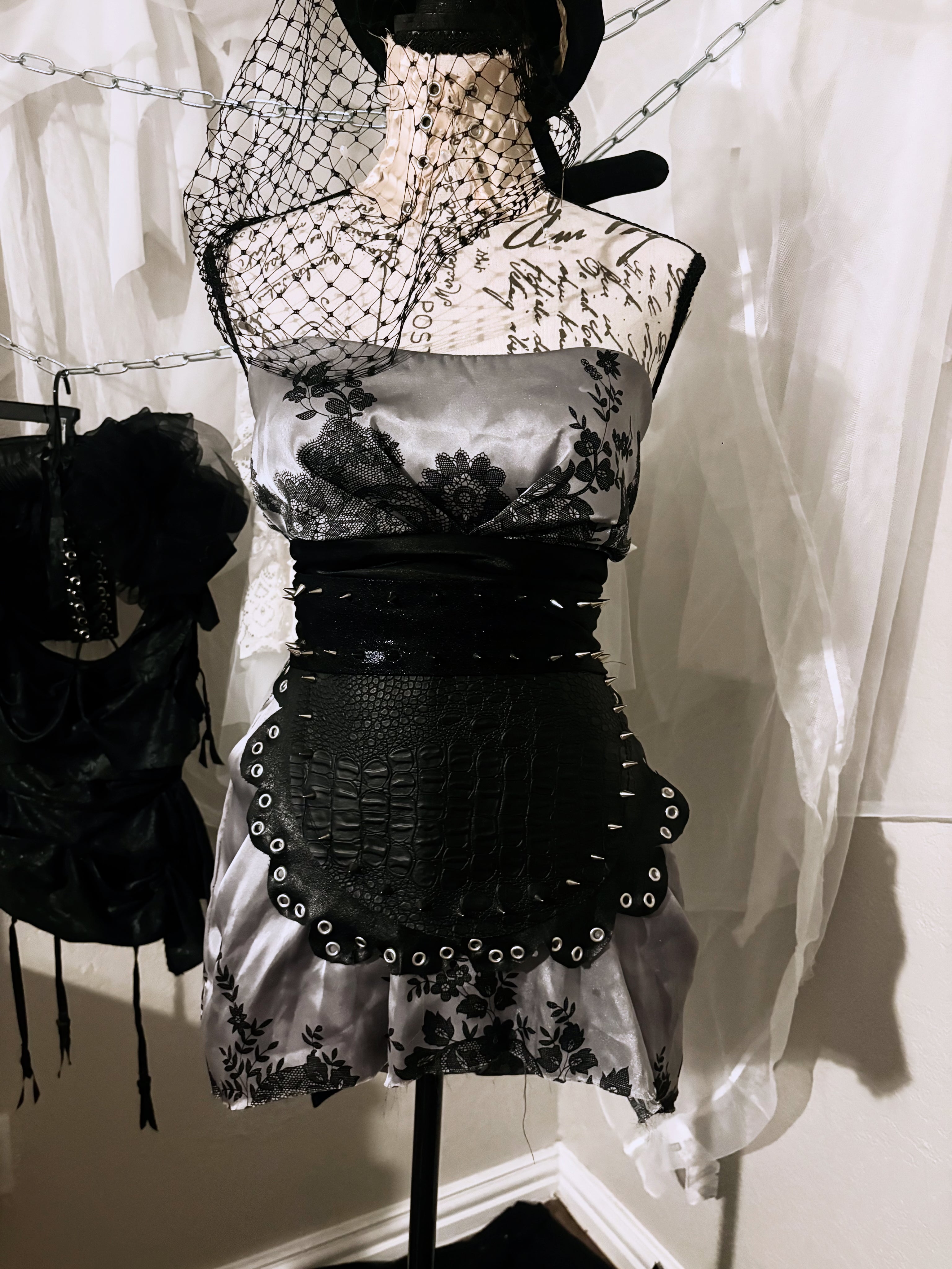 spiked leather apron