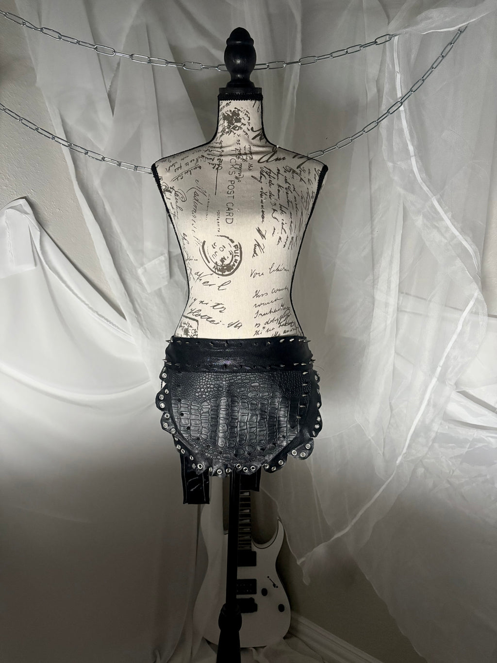 spiked leather apron